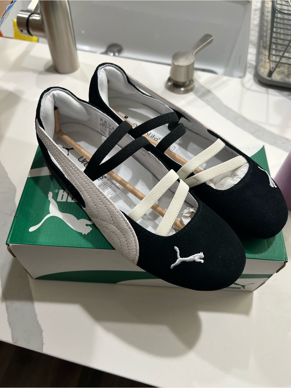 Puma Black and White Ballet-Style Flats with Cross Straps